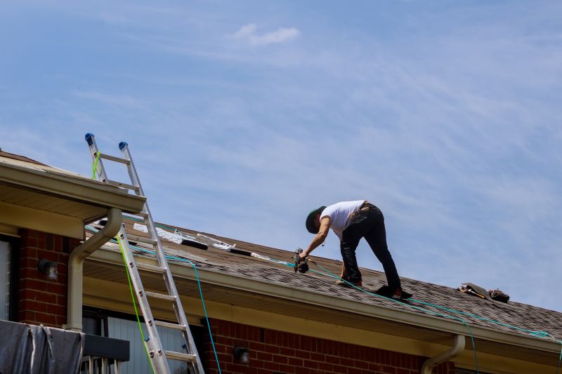 Roofing Crew Performing Repairs
